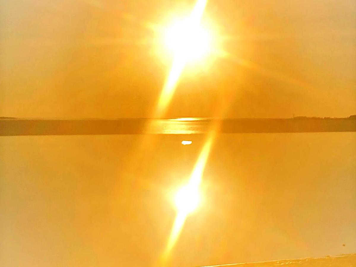 Heijastus tyynellä merellä